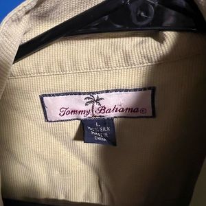 L Tommy Bahama Hawaiian shirt. It’s a yellowish green color